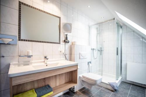 Koupelna v ubytování Hotel Hollmann