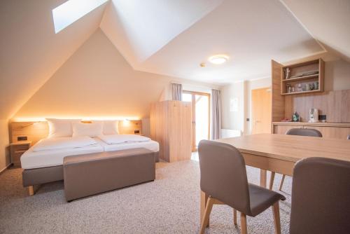 Postel nebo postele na pokoji v ubytování Hotel Hollmann