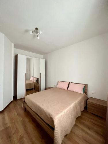 Ένα ή περισσότερα κρεβάτια σε δωμάτιο στο Easy Bergamo Apartment