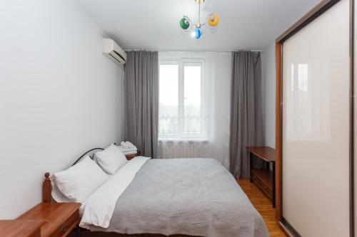 Llit o llits en una habitació de Stefan cel Mare City View