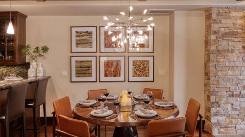 a dining room with a table and chairs at Chalet Crevasse in Vail