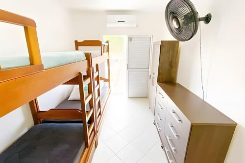 Postel nebo postele na pokoji v ubytování Condomínio Portinari