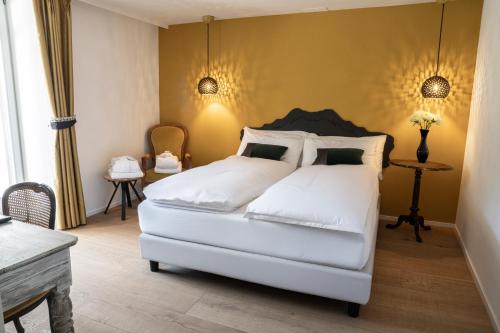 Postel nebo postele na pokoji v ubytování Hotel Meierhof