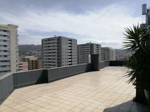 a view of a balcony of a city with buildings at Bragaterrace in Braga