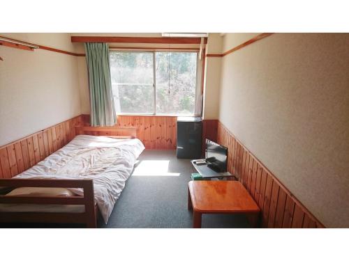 Postel nebo postele na pokoji v ubytování Hotel Sunrise - Vacation STAY 39647v
