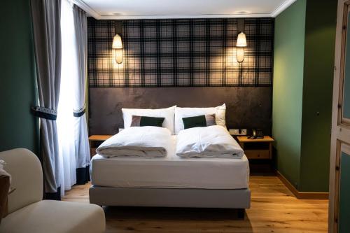 Postel nebo postele na pokoji v ubytování Hotel Meierhof