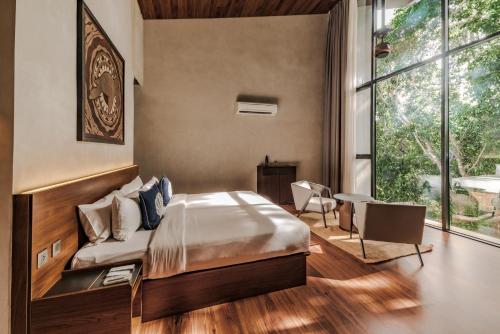 Letto o letti in una camera di Piece Lio from Japan Managed by H Hospitality Group
