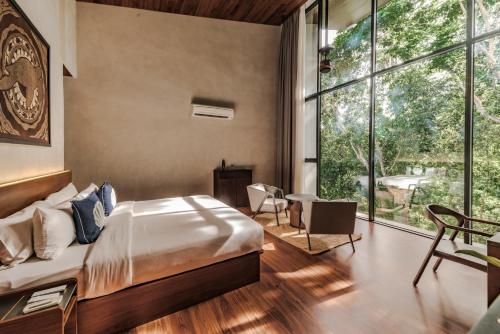 Letto o letti in una camera di Piece Lio from Japan Managed by H Hospitality Group