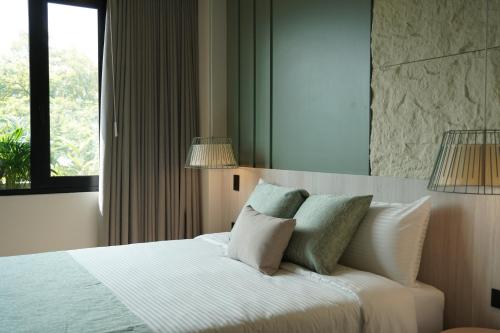 Postel nebo postele na pokoji v ubytování Hotel Ryo 74B