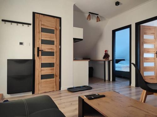 Ένα ή περισσότερα κρεβάτια σε δωμάτιο στο Apartment pod Sysunia