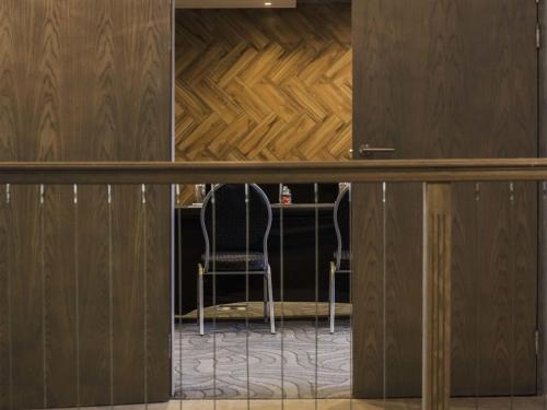 a view of a room with two chairs and a table at Vivari Hotel and Spa by Mantis in Johannesburg
