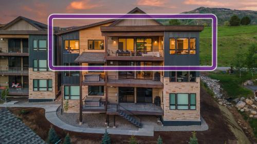 an image of a house with a purple frame around it at Friesian Chalet in Steamboat Springs