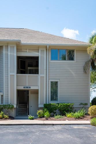 a large white house with a balcony at 1806 Heron Point in Summerville