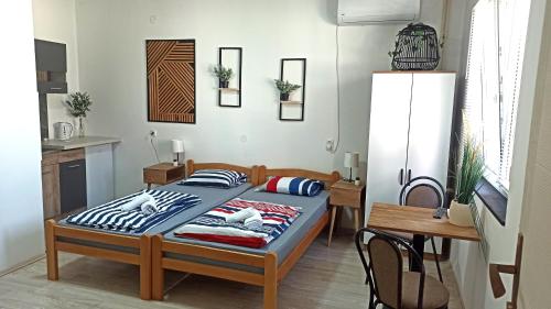 Postel nebo postele na pokoji v ubytování Sunčani apartman - Studio - 4
