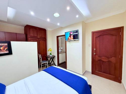 Ένα ή περισσότερα κρεβάτια σε δωμάτιο στο Departamento exclusivo en Machala