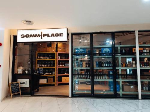 a store with a sign that reads sonknifeage at The Luxe & Colony Infinitum KLCC by CoupleStay in Kuala Lumpur