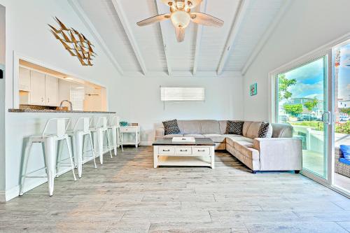 a living room with a couch and a table at Balboa Duplex in Newport Beach