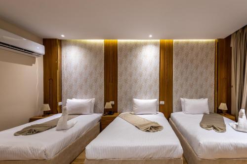 Katil atau katil-katil dalam bilik di Pyramids sunrise inn