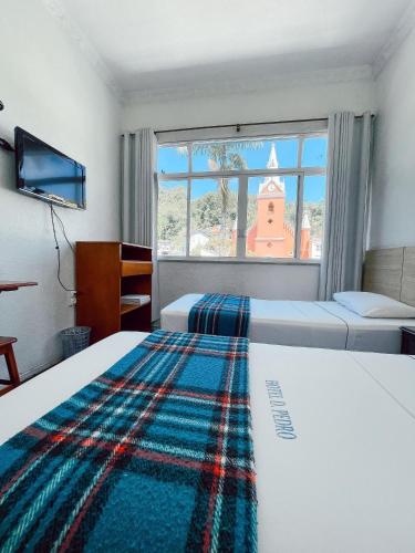 Dom Pedro Hotelにあるベッド