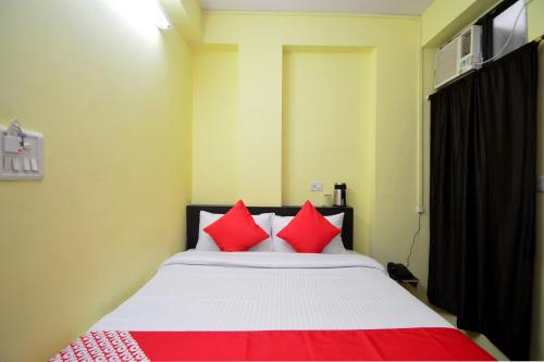Giường trong phòng chung tại Hotel O Reyansh Galaxy