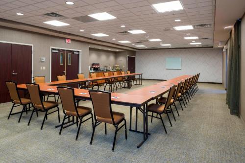 a large conference room with a long table and chairs at SpringHill Suites Midland in Midland