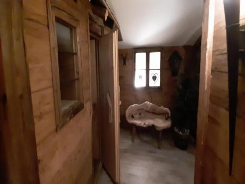 an empty room with a chair and a window at Lush apartment in Bayrischzell with 2 saunas in Bayrischzell