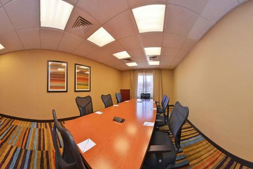 a conference room with a long table and chairs at Fairfield Inn & Suites Santa Maria in Santa Maria