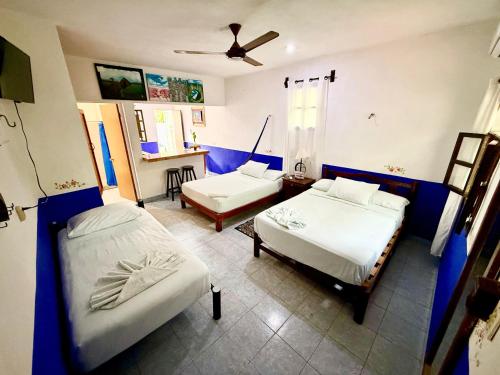 Postel nebo postele na pokoji v ubytování La Casa del Árbol