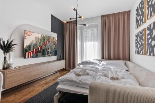 Ένα ή περισσότερα κρεβάτια σε δωμάτιο στο LAM Metropolis - Free Parking - Balcony