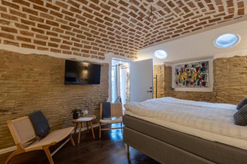 Кровать или кровати в номере Amber Hotel Italy