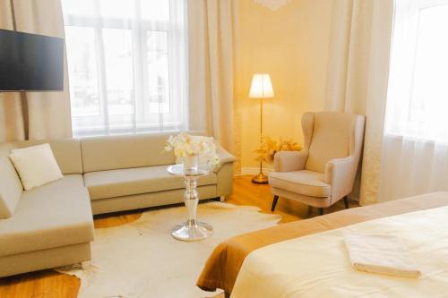 Posezení v ubytování CORNER HOUSE