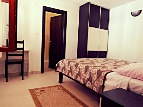 Un ou plusieurs lits dans un hébergement de l'établissement Apartmani Šimić