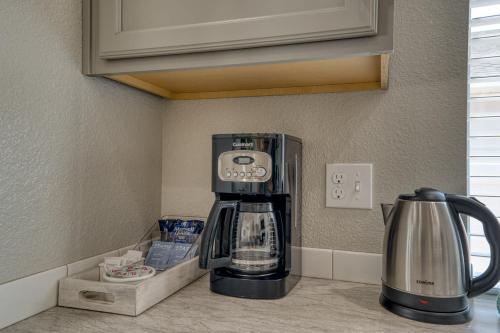 a coffeemaker sitting on a counter in a kitchen at Family Friendly Playroom Garage in Caldwell