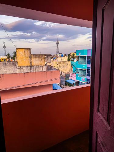 a view of a city from a window at MK Residency Rooms in Tiruvannāmalai