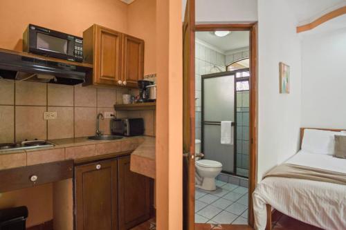 Η κουζίνα ή μικρή κουζίνα στο Apartment F -G Heredia – Good Location