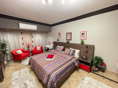 Ένα ή περισσότερα κρεβάτια σε δωμάτιο στο Luxury Apartment- Partial Nile View Cairo