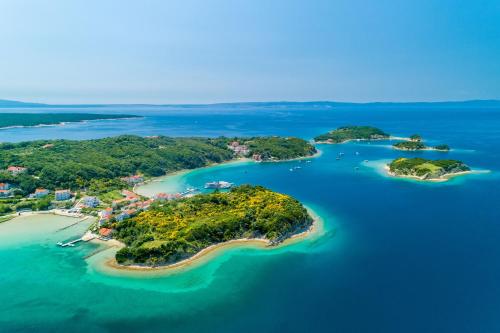 an aerial view of a group of islands in the ocean at Apartments Mig in Supetarska Draga