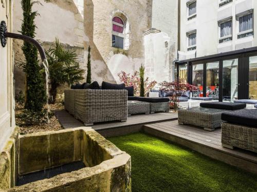 Coin salon dans l'établissement IBIS La Rochelle Vieux Port Centre