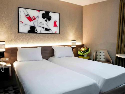 ibis Styles Rouen Nord-Barentinにあるベッド