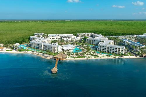an aerial view of a resort in the ocean at Hyatt Ziva Riviera Maya All-Inclusive in Puerto Morelos