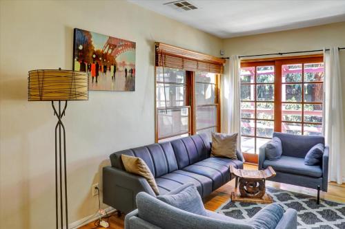 a living room with a blue couch and two chairs at Entire House,Convinient location in Los Angeles , near Universal, Hollywood, Pets Friendly, Free WIFI in Sherman Oaks Community Hospital Heliport