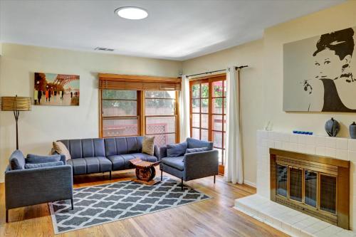 a living room with a couch and a fireplace at Entire House,Convinient location in Los Angeles , near Universal, Hollywood, Pets Friendly, Free WIFI in Sherman Oaks Community Hospital Heliport