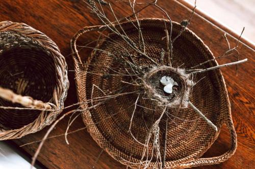 two baskets sitting on top of a wooden table at Mountain View - Sealladh Beinne in Falmouth