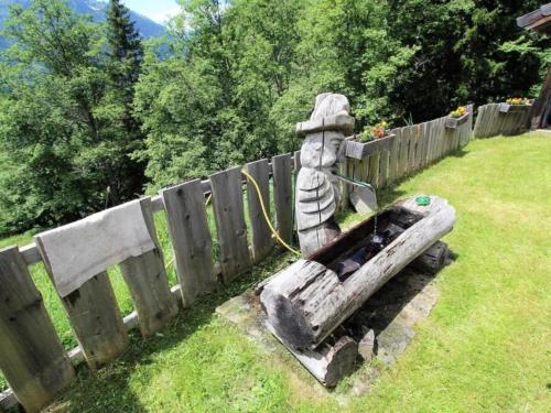 Un jardín fuera de Almhütte Unterhofer