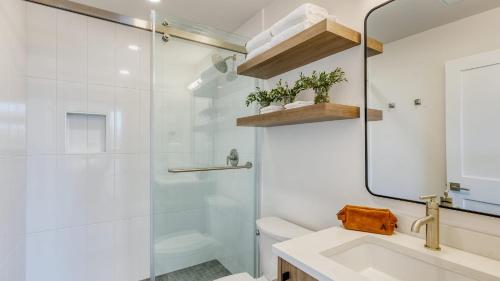 a bathroom with a shower and a sink at 1119 Aerie Buyout 2 Units Near Old Bend Hot Tub Mountain View in Bend