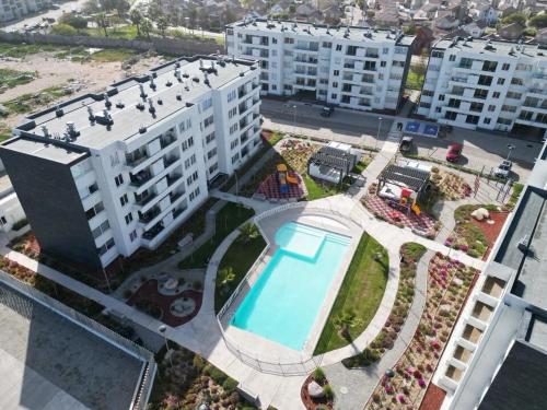 Bazén v ubytování Departamento 2D 2B en Serena a minutos de la playa nebo v jeho okolí
