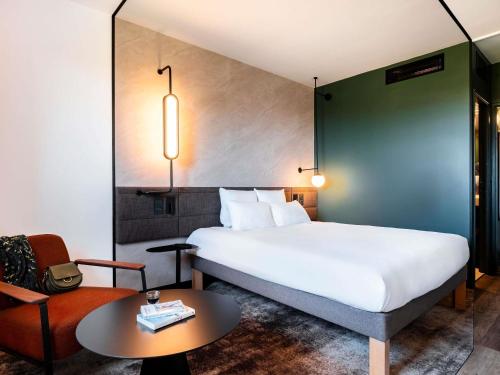Un ou plusieurs lits dans un hébergement de l'établissement Novotel Atria Nimes Centre