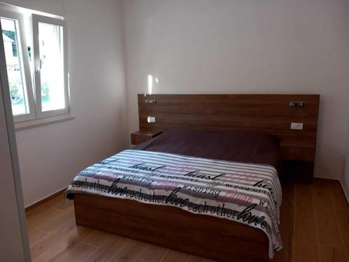 Ένα ή περισσότερα κρεβάτια σε δωμάτιο στο Two Bedroom Apartment with Terrace A1 ST