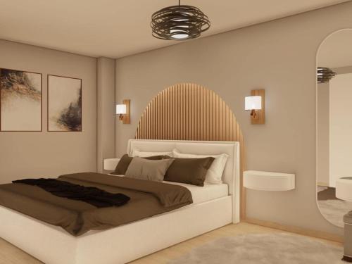 a bedroom with a white bed and a mirror at Villa Marina - Five Bedroom Villa With Pool in Mlinište