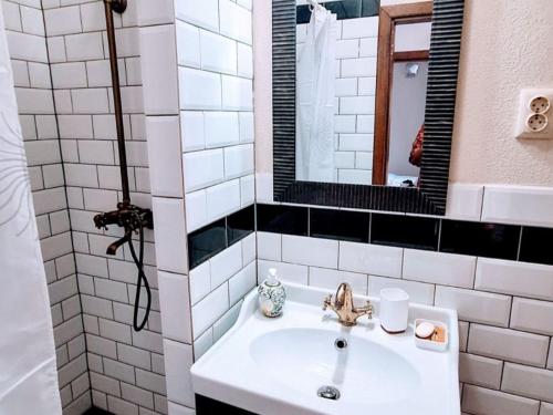 Ένα μπάνιο στο La Casa Nostra Apartments - Comfort 1 Bedroom Apt